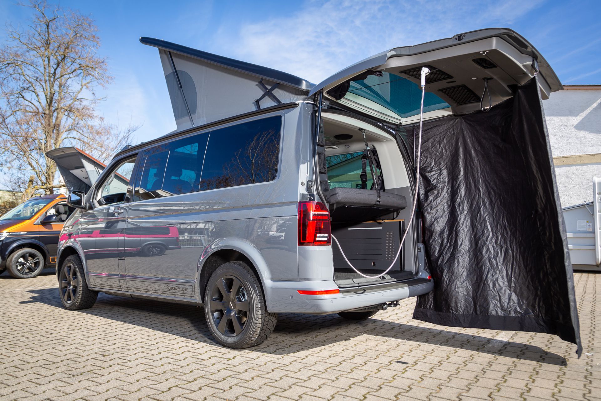 HeckzeltDer SpaceCamper VW T6.1 Camping-Ausbau - Reisemobil und